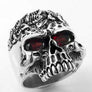 แหวนเงินแท้หัวกะโหลกคนป่า ฝังพลอยแดง