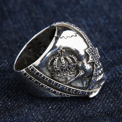แหวนเงินแท้ 925 กะโหลกโจรสลัด ตาแซฟไฟร์สีน้ำเงิน ลายมงกุฎอีกด้าน