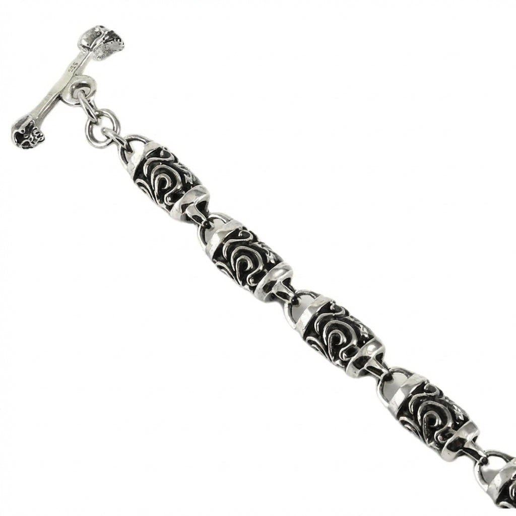 สร้อยข้อมือข้อทรงกระบอกไทรบัลเงินแท้ 925 ภาพจัดวางสินค้าให้เห็นรูปทรง
