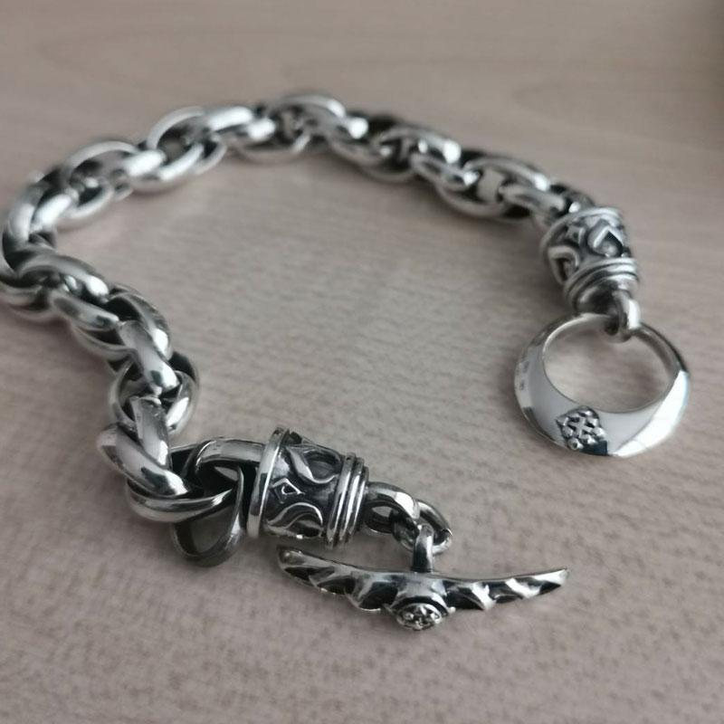 สร้อยข้อมือข้อโซ่ไทรบัลเงินแท้ 925 ตัวล็อกแท่ง ภาพจัดวางสร้อยข้อมือเป็นวง