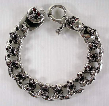 สร้อยข้อมือเงินแท้ ดีไซน์กะโหลกหลายหัว ฝังตาแดง